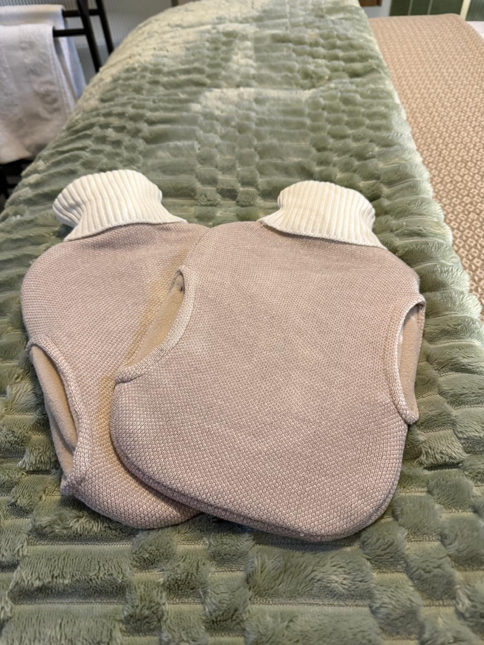 Hot water bottles on the bed for chilly winter nights