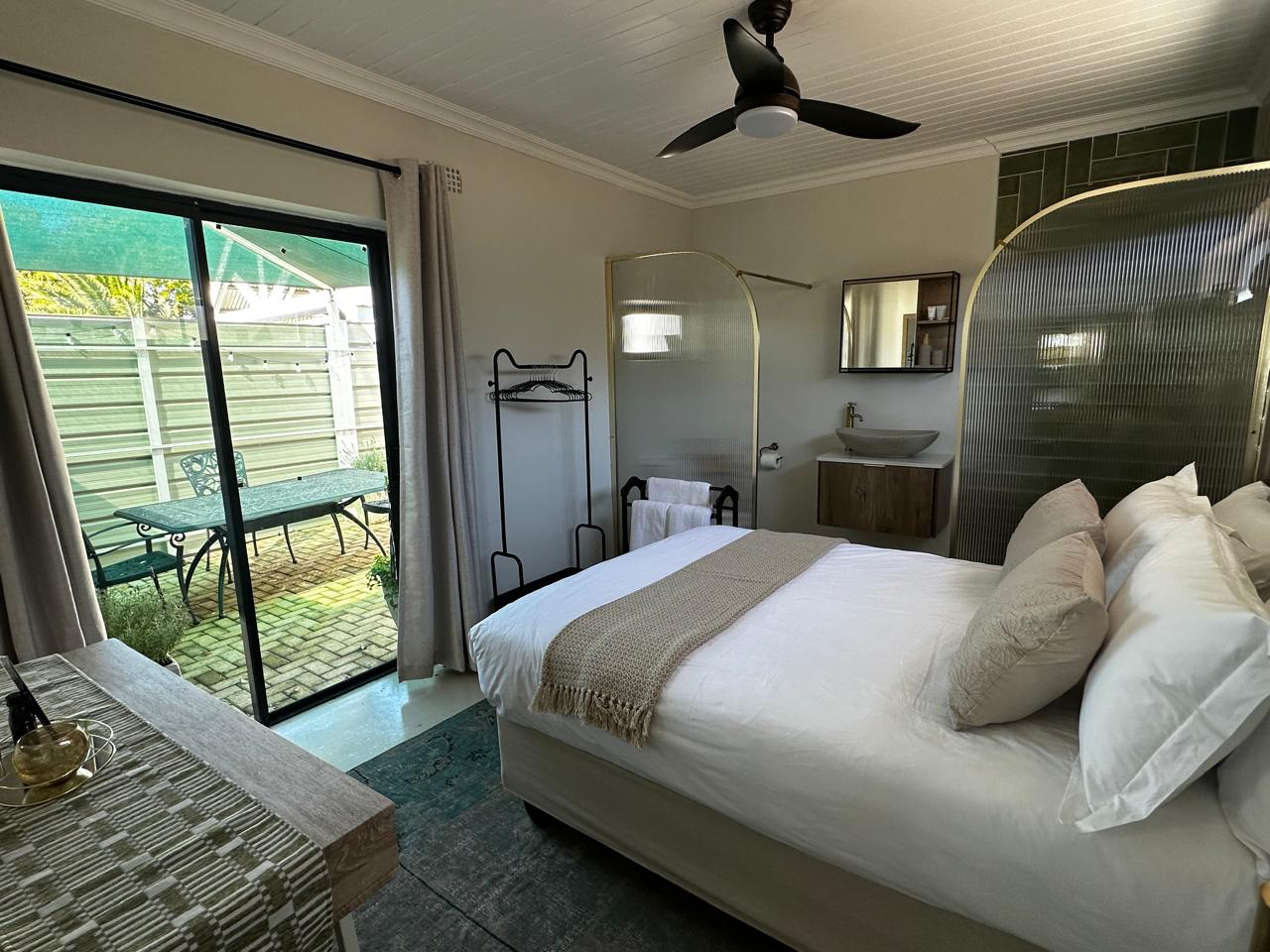 Bedroom with patio and en suite bathroom preview
