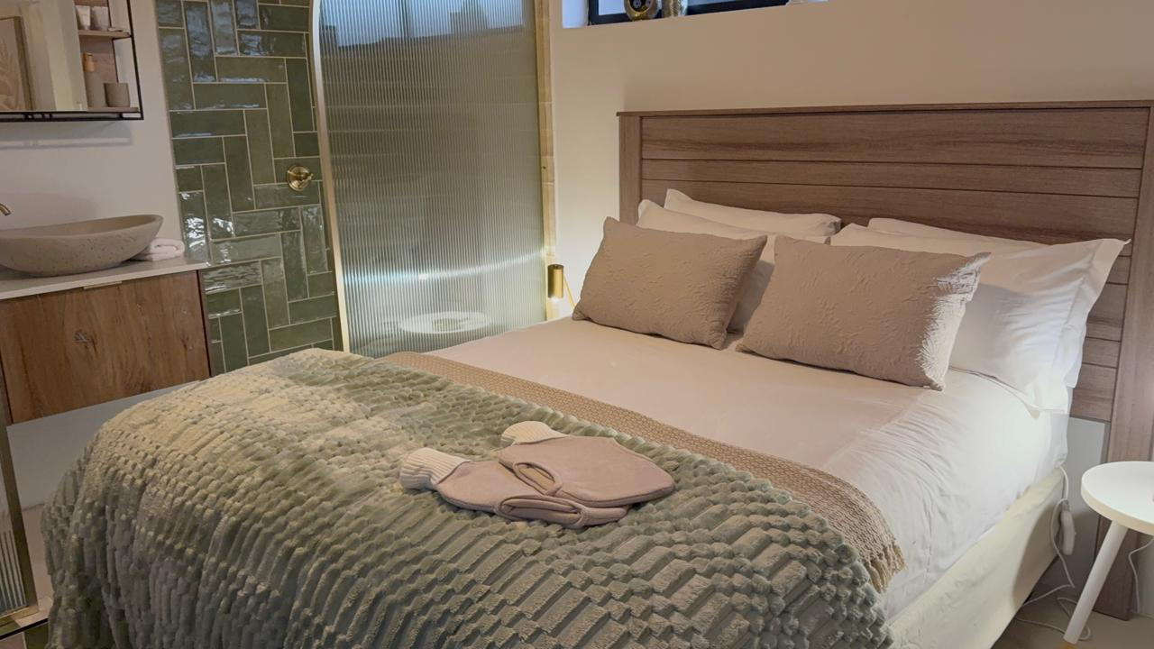 Warm bedroom setup with cozy throws