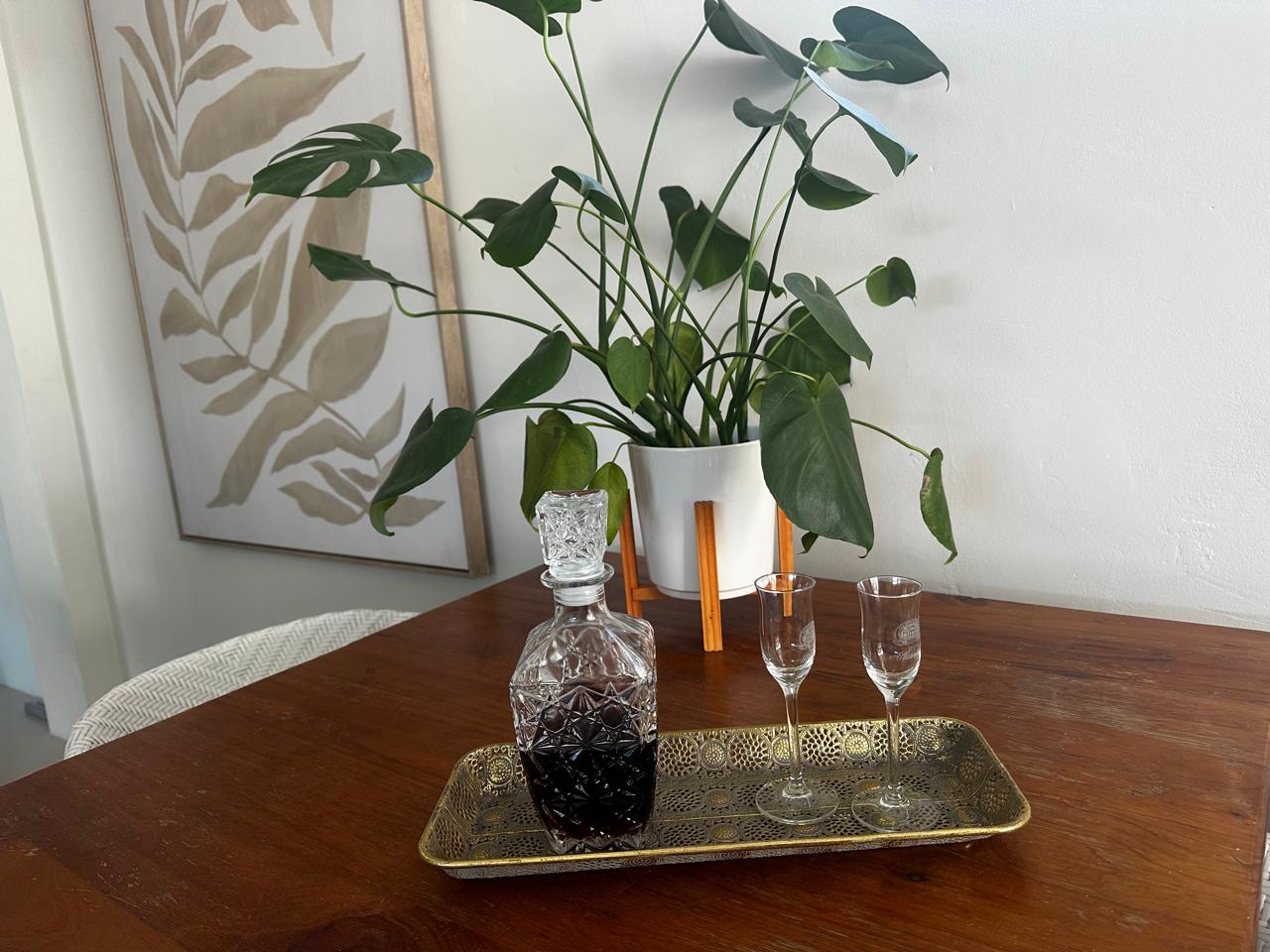 Dining table detail with decanter and glasses